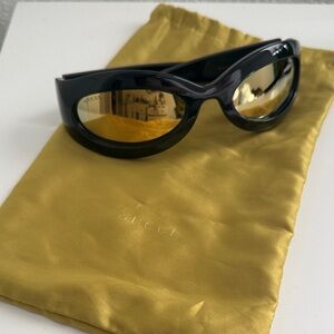 Gucci Glossy Black Sunglasses with Gold Lenses